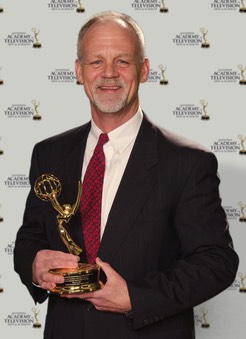 Bryce Lane with emmy award