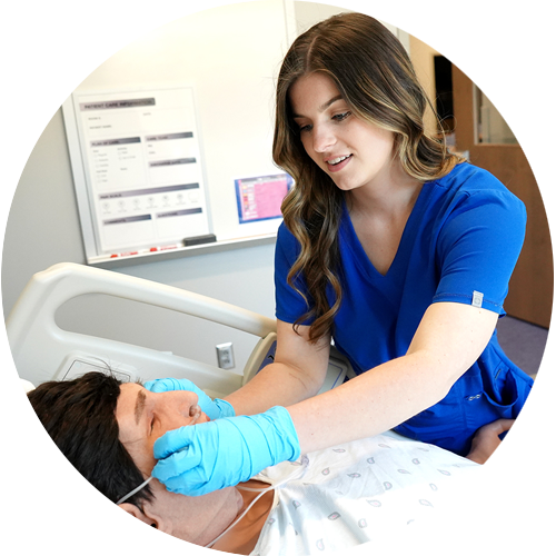 Health Science student with medical dummy