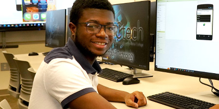 black male student in computer lab